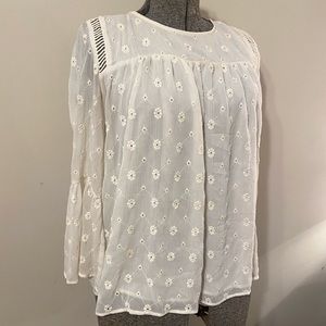 70s-inspired bell sleeved blouse